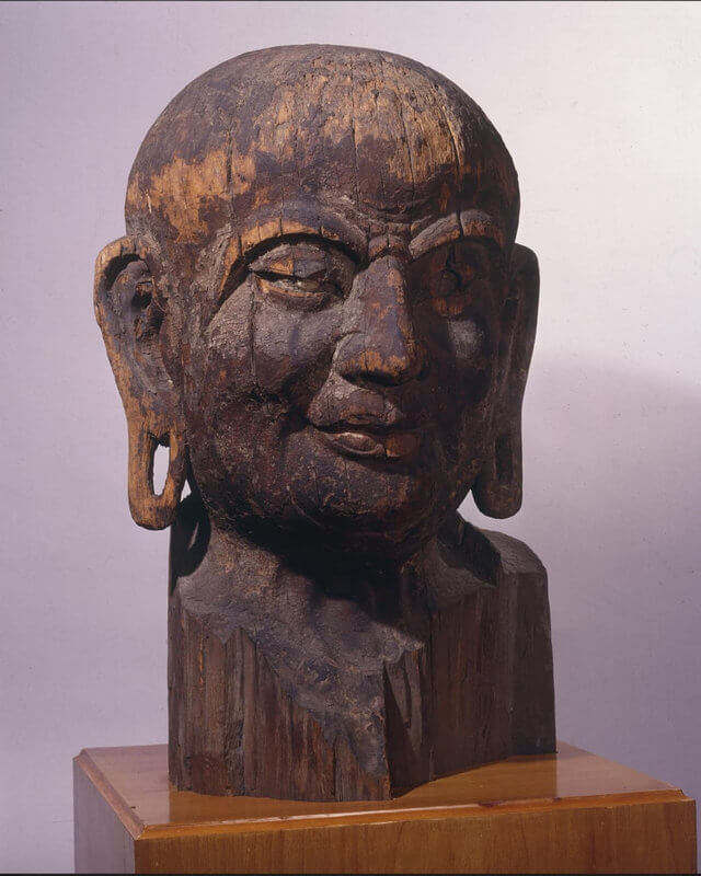 Head of Kasyapa, wood, Tang (A.D. 618-907) H. 77 cm.