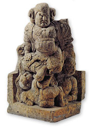 Lokapala. Stone. Tang (A.D. 618-907) H. 72cm.